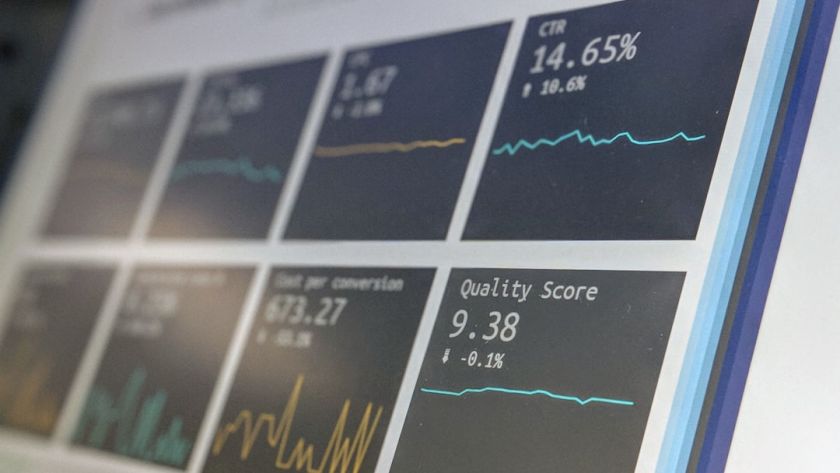 Data reporting dashboard on a laptop screen.