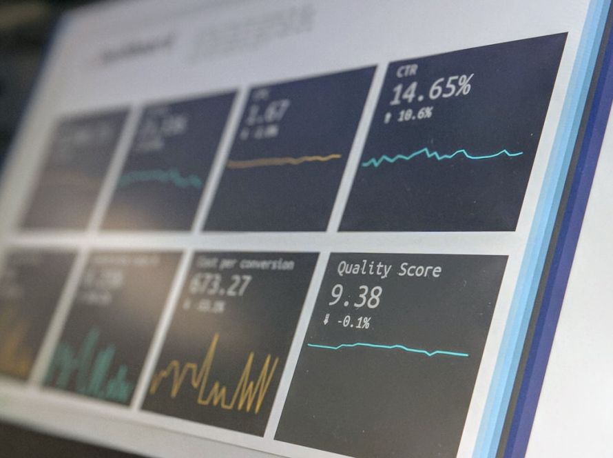 Data reporting dashboard on a laptop screen.