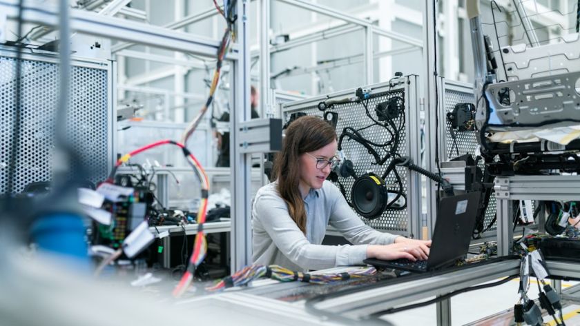 Female electronics engineer runs vehicle tests